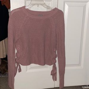 blush covered sweater with tie details
